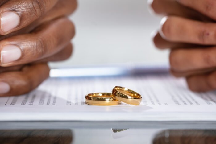 Couple Hands On Divorce Agreement Couple Hands On Divorce Agreement